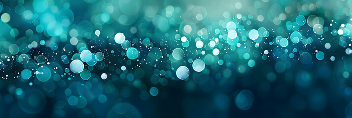 Glowing teal background with abstract blue bokeh perfect for a holiday concept Copy space image for a banner