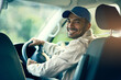 © peopleimages.com - Portrait, driver or delivery man with smile for safety on cargo, stock or package in van in shipping business. Parcel order, car or happy courier driving in transportation for supply chain or freight