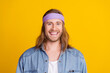 © deagreez - Photo portrait of attractive young hippie man look camera toothy smile wear trendy denim outfit isolated on yellow color background
