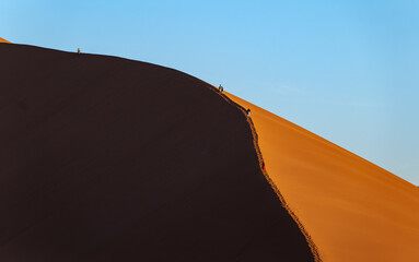 Wall Mural - the world's largest sand dunes in Namibia, Africa, sunset colors