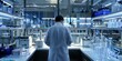 © StudioPix - Scientist in the lab, back view, working with electrophoresis equipment, sophisticated lab tools nearby