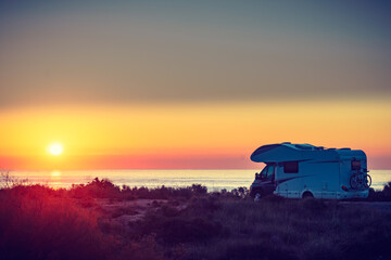 Canvas Print - Caravan on sea at sunrise.