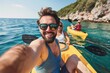 © Space Priest - A man in blue tank top and sunglasses is taking a selfie in a kayak with two other people