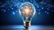 © wasana - Illuminated light bulb with digital connection, showcasing modern technology and innovation