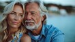 © aicandy - A serene and intimate portrait of a smiling middle-aged couple with grey hair, enjoying a peaceful moment together outdoors during sunset