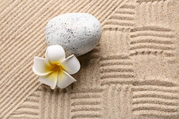 Wall Mural - Stone and plumeria on sand. Zen concept