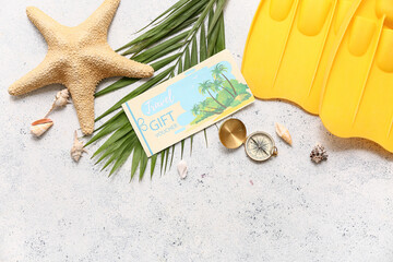 Sticker - Composition with travel gift voucher, vintage compass, flippers and palm leaf on light background