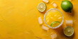© Vasiliy - A refreshing iced citrus cocktail in a salt-rimmed glass garnished with lime wedges surrounded by ice cubes and whole limes on a vibrant yellow textured background