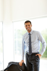 Canvas Print - Portrait, smile and business man in office for career, job and working at corporate company in Italy. Happy professional, entrepreneur and confident salesman at workplace, employee or expert worker