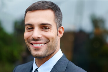 Canvas Print - Face, man and happy on portrait as lawyer for career or job growth and opportunity with startup business. Male employee, smile and satisfied for law firm progress as attorney or legal advisor