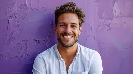 Poster - Young professional man with a friendly smile, standing against a vivid purple background