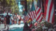 © sara - A row of American flags lines a city street on Memorial Day.