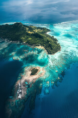 Canvas Print - Vibrant Aerial Discovery of Uncharted Island in Blue Waters  