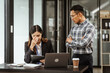 © M+Isolation+Photo - Young businesswoman and other Asian individuals are seen working at desks. Accountability, faultfinding, negligence, and other aspects of recruitment, staffing, and talent management being discussed.
