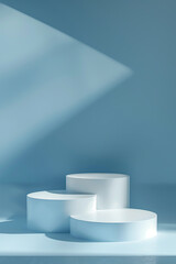 White empty podium for product presentation, minimal background, light blue