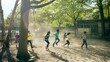 © Felippe Lopes - Children joyfully play and run in a school playground on a sunny day, surrounded by green trees and soft sunlight, enjoying outdoor activities.