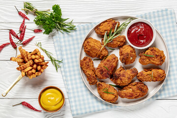 Poster - american style fried chicken wings on a plate