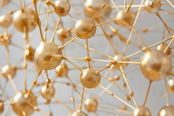 A pattern of interconnected gold spheres forming an intricate geometric network on light grey background, creating the illusion that they form a three dimensional grid structure

