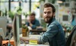 © Patrick - Smiling man with beard working in office