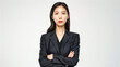 © Graphic Master - Chinese corporate woman standing with crossed arms