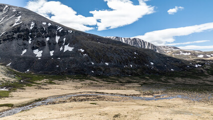 Wall Mural - stunning landscapes of mountains, lakes and rivers from a drone flight in the southern regions of Altai in May