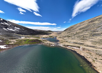 Wall Mural - stunning landscapes of mountains, lakes and rivers from a drone flight in the southern regions of Altai in May