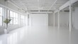 © kitipol - A pristine white studio space with minimalist decor and soft lighting, providing an ideal environment for creative work and artistic expression.
