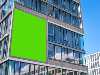 City Centre Downtown Tall Skyscraper modern building with green screen advertising billboard cut out