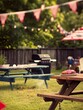 © tantawat - A backyard barbecue scene with a grill, picnic table, and festive decorations, with a blurred background to highlight the copyspace for Independence Day messages.