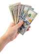 © artiom.photo - USA American money dollars bills. Man hand holding stack of money. Cash for rent, credit payment. One hundred dollars or 100 dollar bill. United States of America. Bank financing. Isolated background