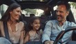 © Cetin - Happy family sitting in the car