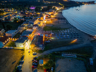 Wall Mural - Beautiful drone view of roda beach village in north corfu, Greece , Night view in summer