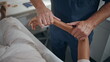 © stockbusters - Physiotherapist examine woman arm in clinic closeup. Man examine trauma recovery
