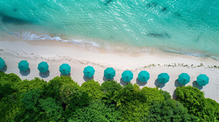 Poster - Aerial view of the crystal clear blue ocean, white sand beach, green palm trees and turquoise umbrellas