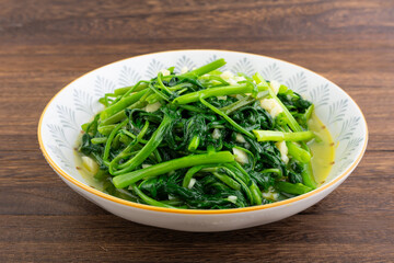 Wall Mural - A dish of garlic water spinach