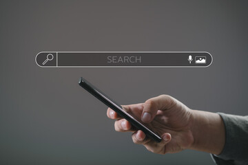 Wall Mural - man's hands are finger point to searching for information. using search console with your website. d