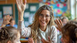 © rabia - Happy teacher and schoolgirl giving high five during class at school.