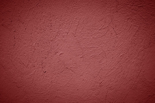 red stucco textured wall background