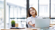 © David - asian woman work at laptop thinking of problem solution, thoughtful female employee pondering considering idea looking at computer screen making decision