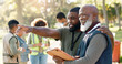 © HockleyMedia24/peopleimages.com - Park, people and volunteers planning with tablet for support, community project or nature sustainability. Humanitarian, recycling or senior leader in charity service or NGO for pollution cleanup