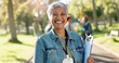 © HockleyMedia24/peopleimages.com - Charity, woman and portrait of volunteer with clipboard for waste checklist, inspection and community service. Female manager, park or nature for cleaning, nonprofit project and welfare with smile