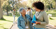 © peopleimages.com - Happy, woman and volunteer talking in outdoors of traffic cones for activity management, safety protocol or crowd control. Smile, people and park assistance for charity responsibility of coordination