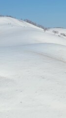 Fototapete - Vertical Aerial video from drone on winter snow landscape. Biryuksinsky mountain pass in Altai.