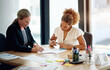 © ArcursPI/peopleimages.com - Documents, meeting and business women in office for discussion, legal consulting and agreement. Corporate lawyer, law agency and woman with client and paperwork for contract, collaboration and report
