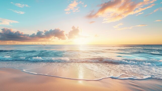 A serene beach scene at sunset with smooth sand and ample space in the sky for adding text.