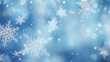 © TiA - Falling  Snowflakes on Blue Abstract Background with Bokeh and Copy Space