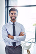 © peopleimages.com - Lawyer, crossed arms and portrait of business man in office with company pride, confidence and ambition. Corporate, professional and happy person in law agency for legal consulting, job and career