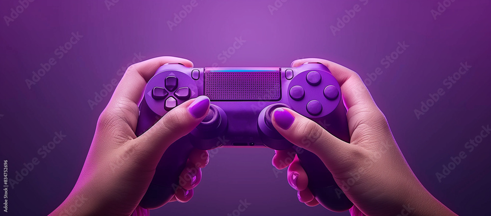 Hand holding game controller with digital screen showing gaming ...