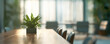 © MCGORIE - Blurred background of a modern office meeting room with a table and chairs for a business concept