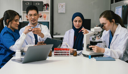 Wall Mural - diversity, medical team working on digital tablet healthcare doctor technology tablet using computer